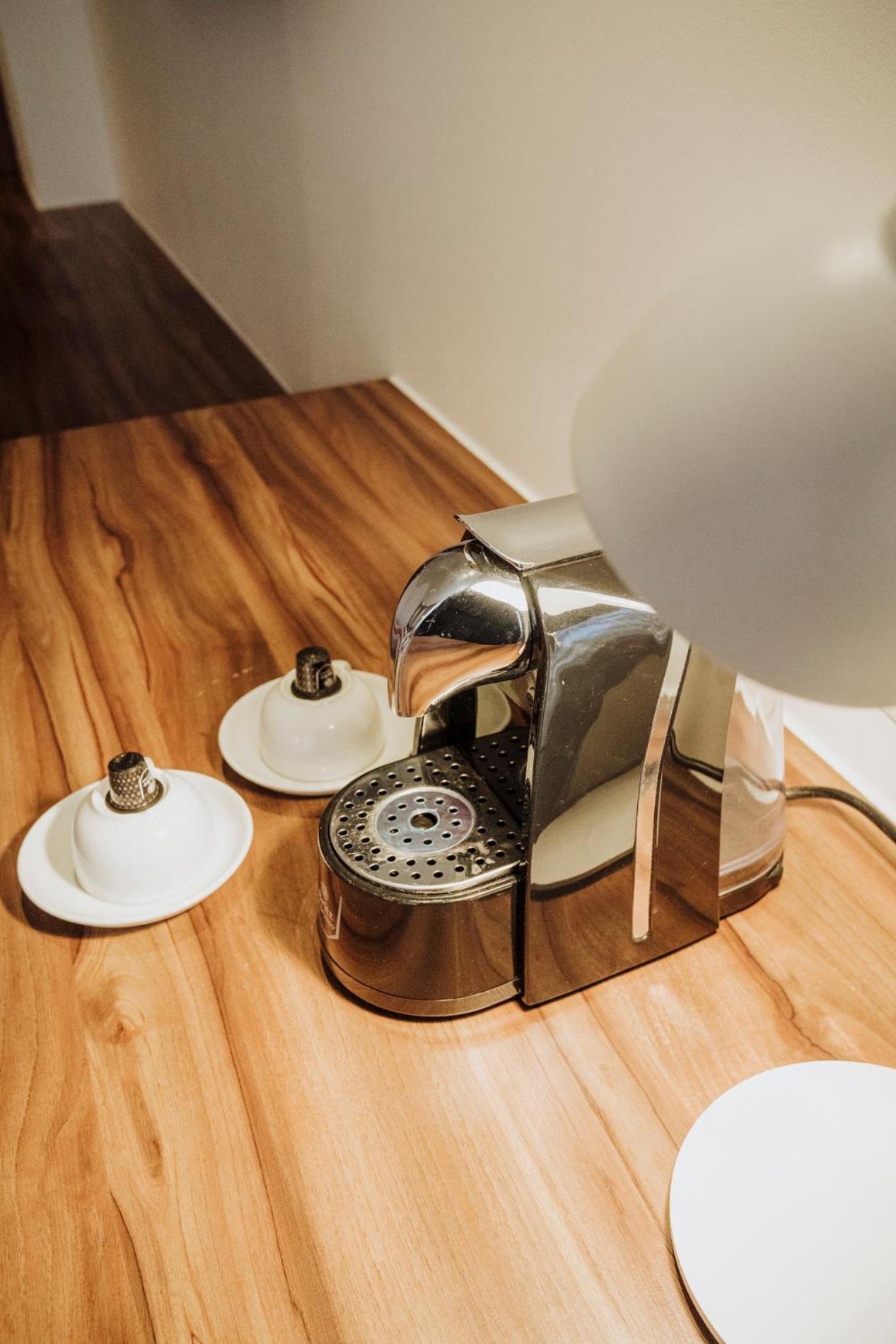 Novotel Medellin El Tesoro Ngoại thất bức ảnh A Nespresso coffee machine