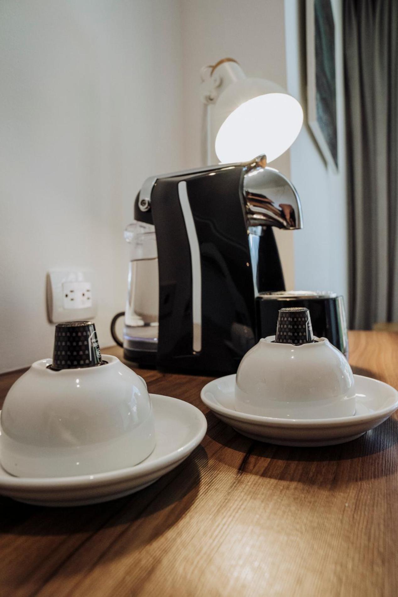 Novotel Medellin El Tesoro Ngoại thất bức ảnh A Nespresso coffee machine
