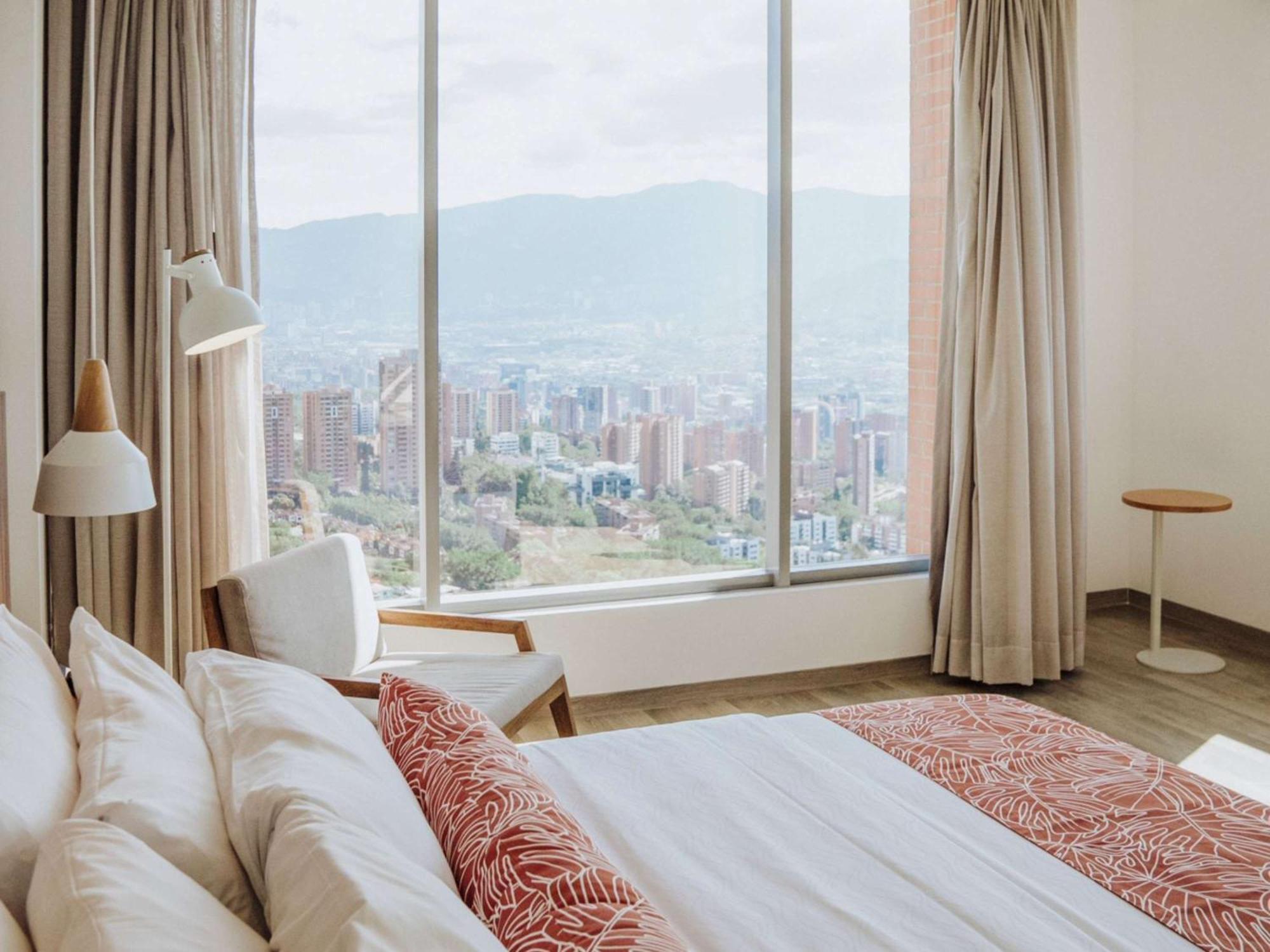 Novotel Medellin El Tesoro Ngoại thất bức ảnh A bedroom at the hotel