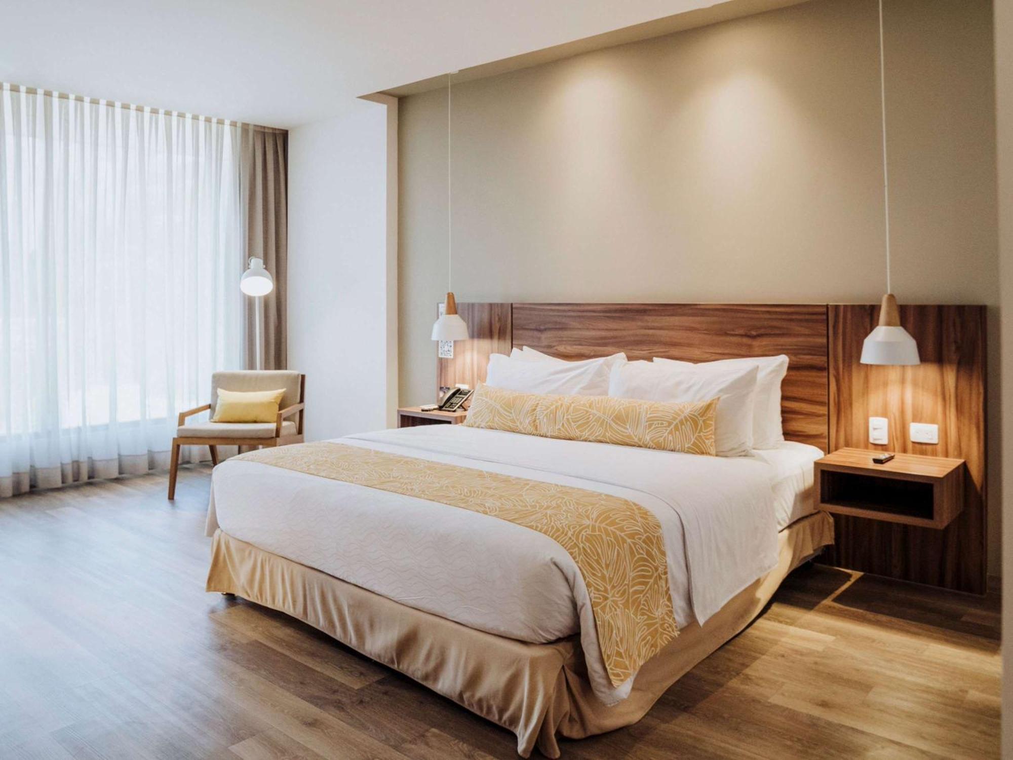 Novotel Medellin El Tesoro Ngoại thất bức ảnh A bedroom at the hotel